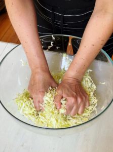 kneading sauerkraut